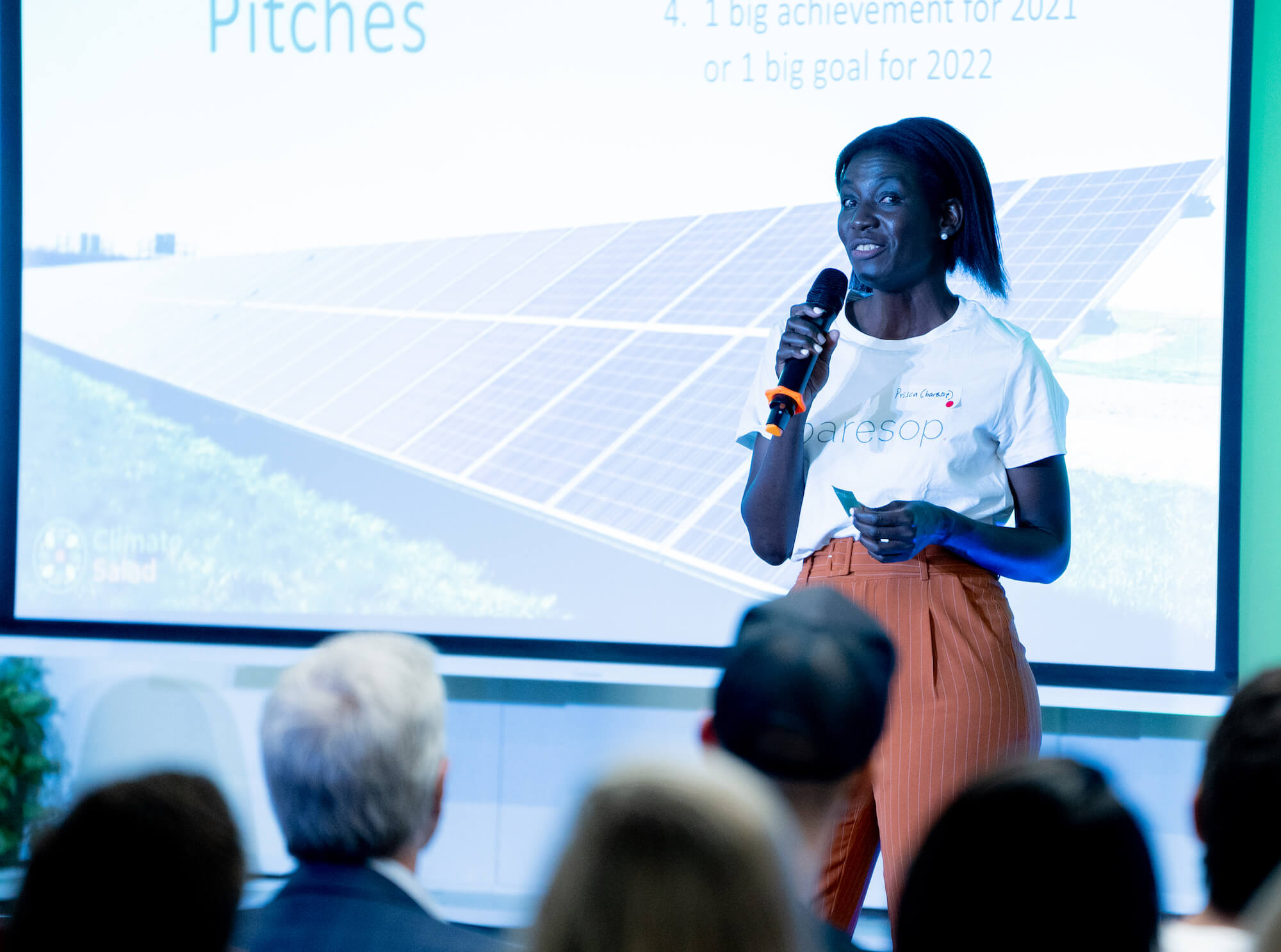 Person giving a talk on a stage
